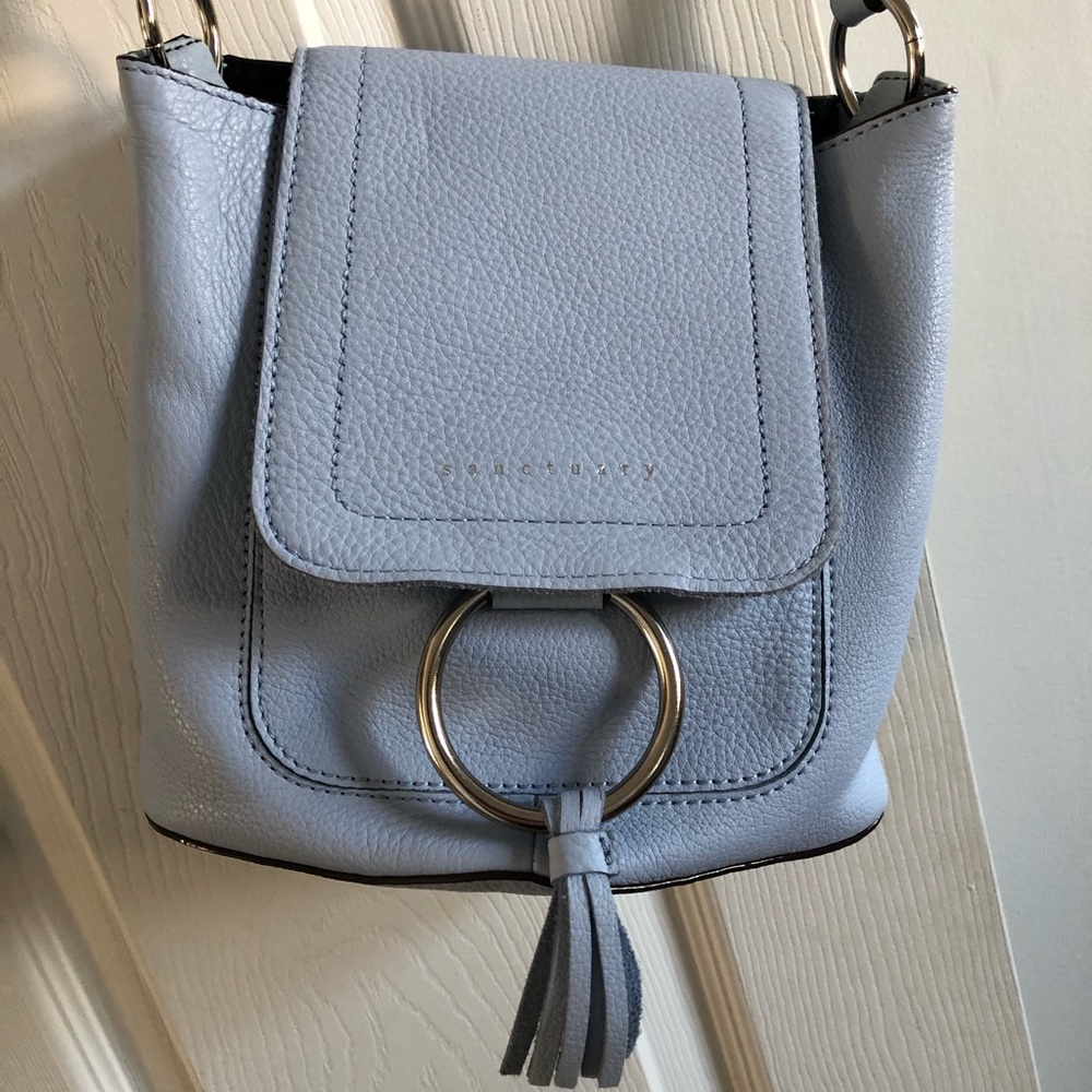 Faux leather blue woman’s cross body bag